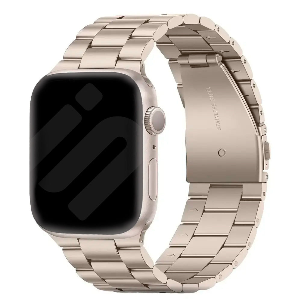 Ocelový řemínek pro Apple Watch v barvě Starlight — propojené články, bezpečná skládací spona